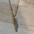 Collier plume acier inoxydable